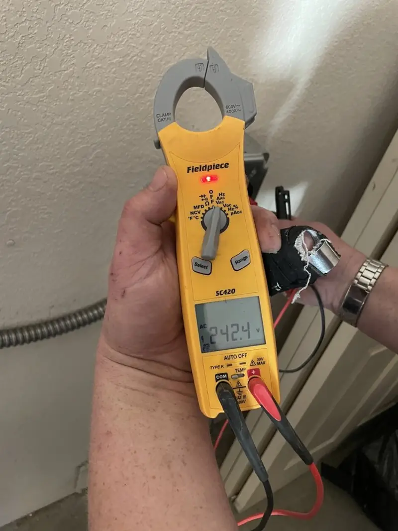 Voltage testing with clamp meter during Generator Installation in Kendallville